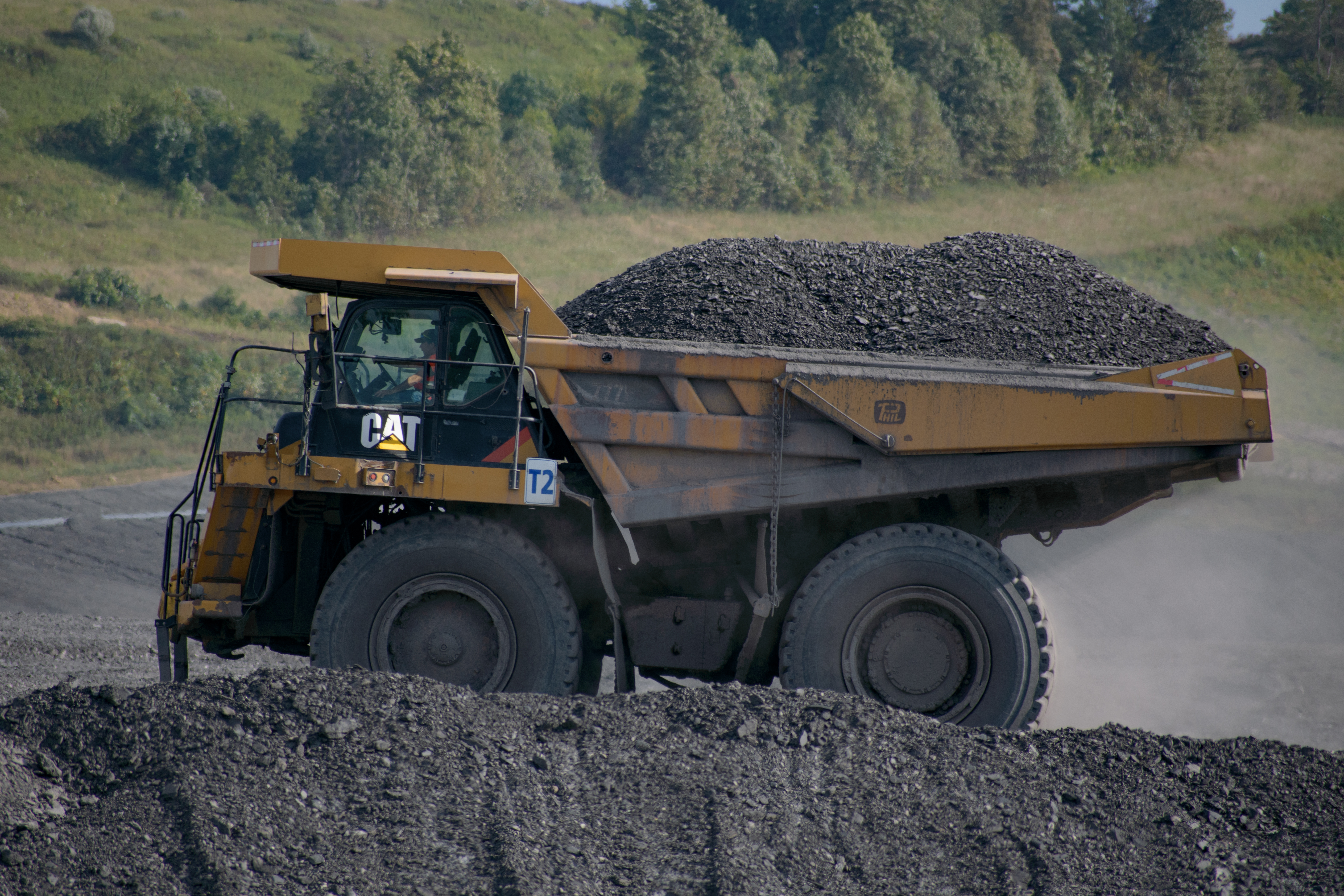A CAT mining truck carries coal waste to the refuse disposal area of the Bailey Central Mine Complex in Graysville, PA.